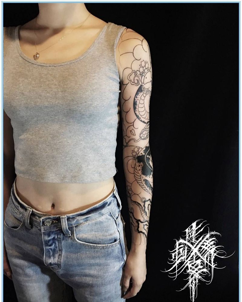 传统蛇花臂未完待续纹身图片_手臂老传统花臂蛇纹身图案