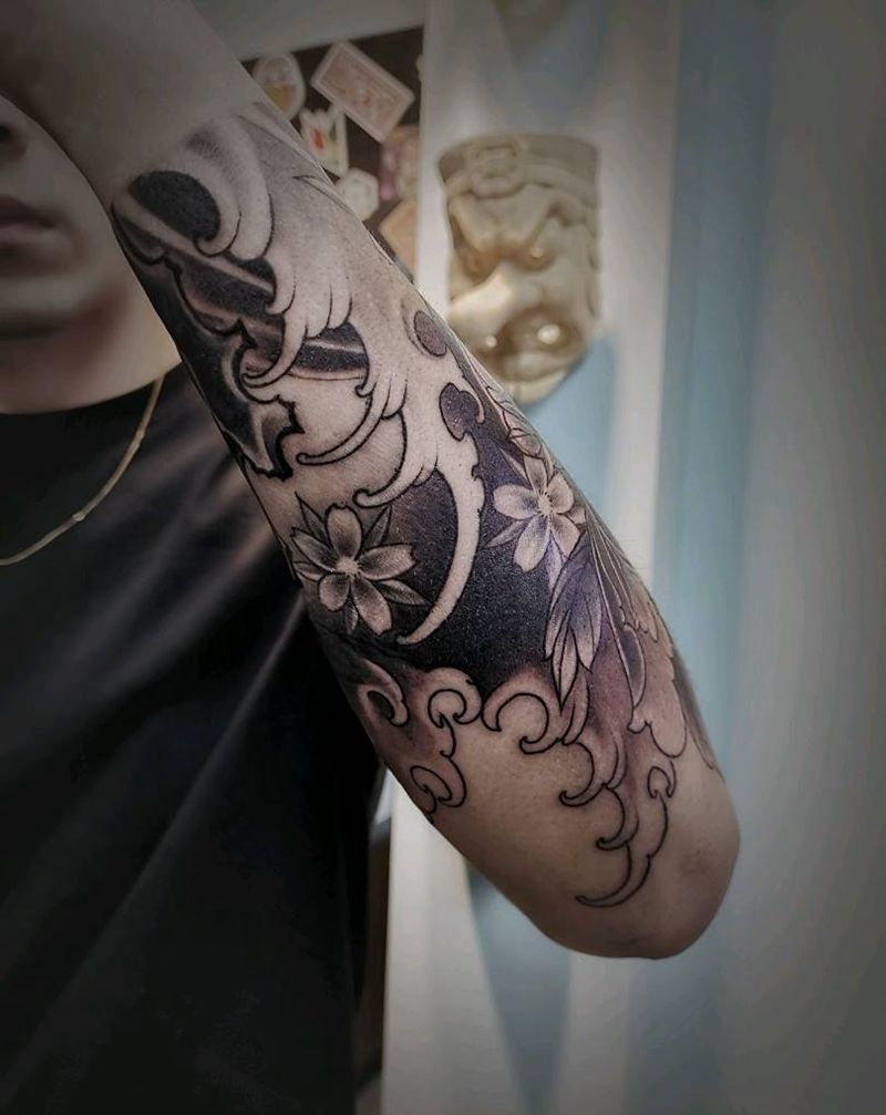 牡丹衔接包小臂纹身图片_手臂新传统牡丹包小臂纹身图案