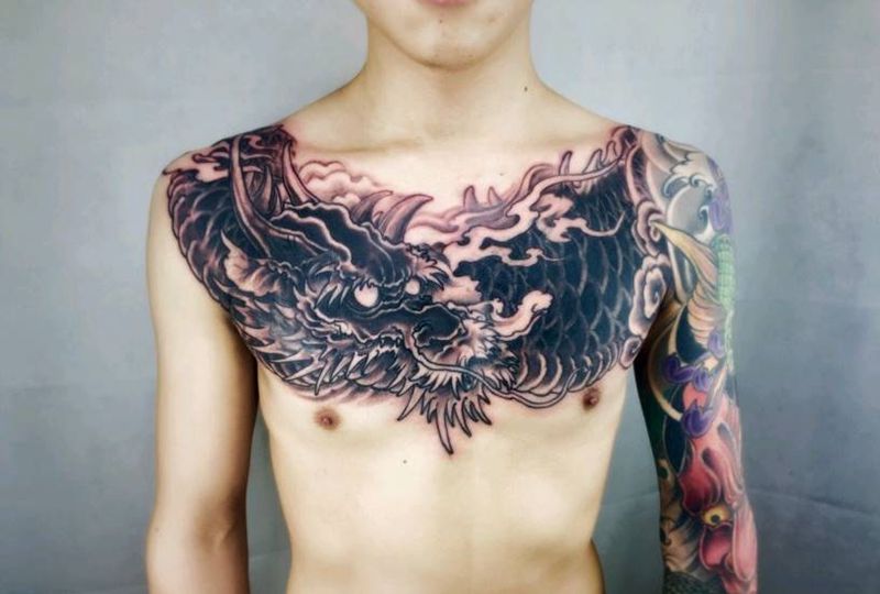 花胸遮盖完成纹身图片