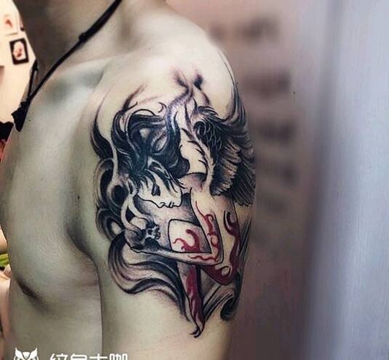 大臂纹身纹身图片_手臂大臂纹身图案