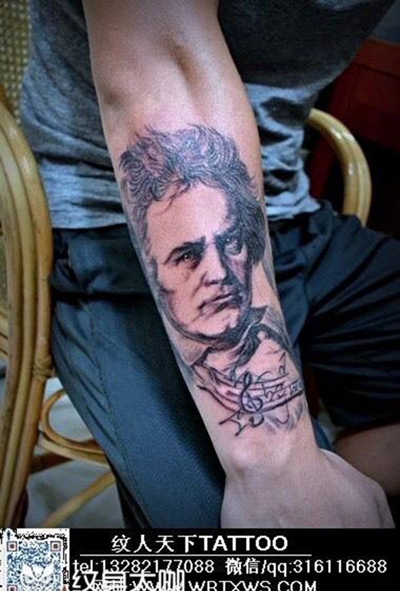 玩音乐的人纹身图片