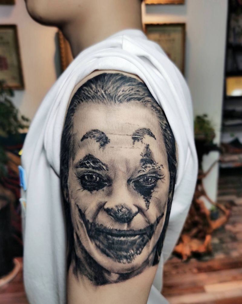 小丑、杰昆·菲尼克斯纹身图片_手臂欧美写实纹身图案