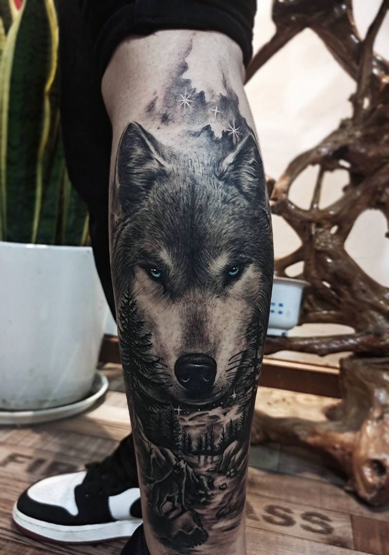 北方的狼纹身图片_腿部欧美写实狼纹身图案