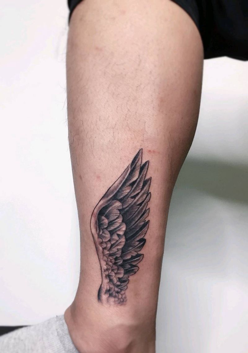翅膀纹身纹身图片_腿部新传统纹身图案