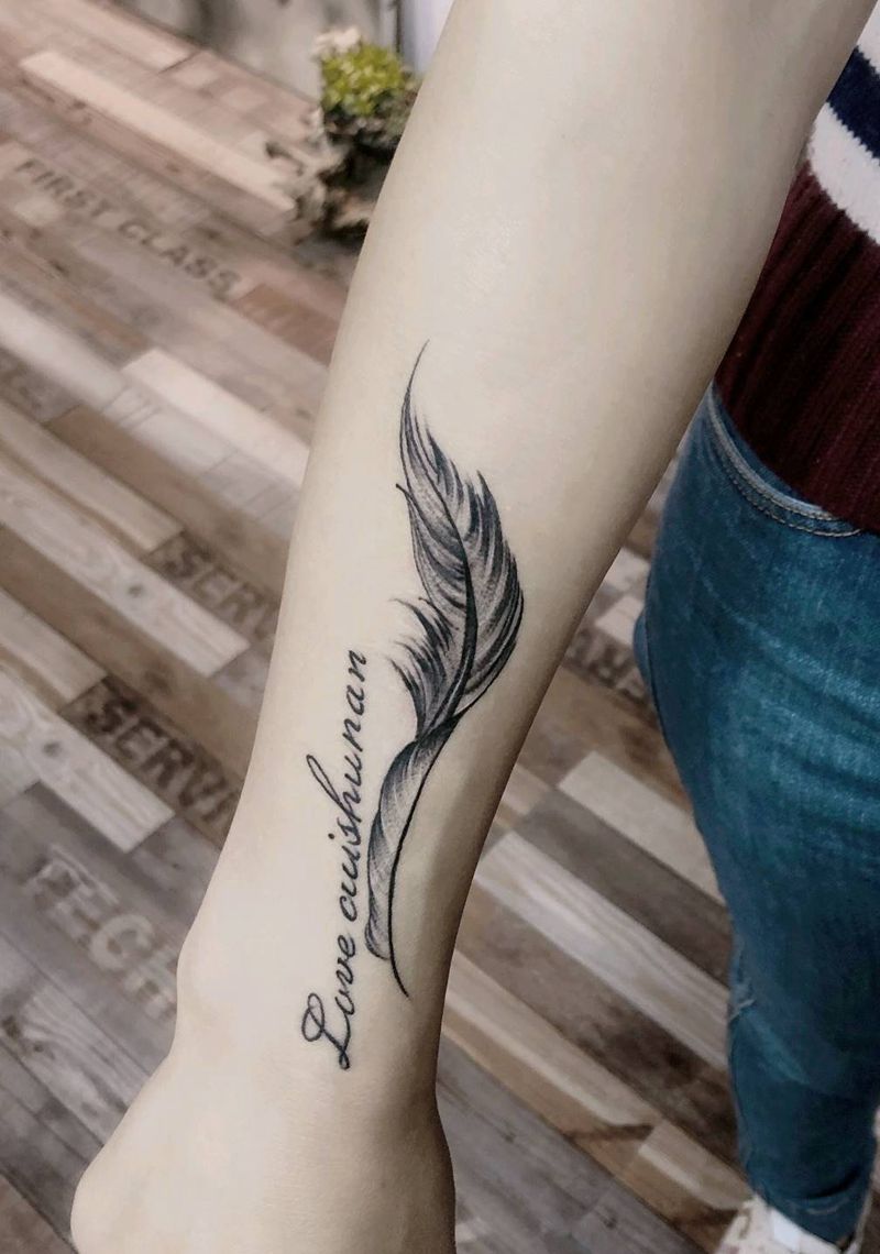 羽毛纹身纹身图片_手臂纹身图案