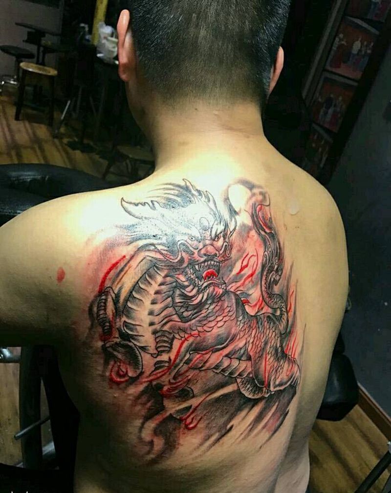 进行中的麒麟纹身图片