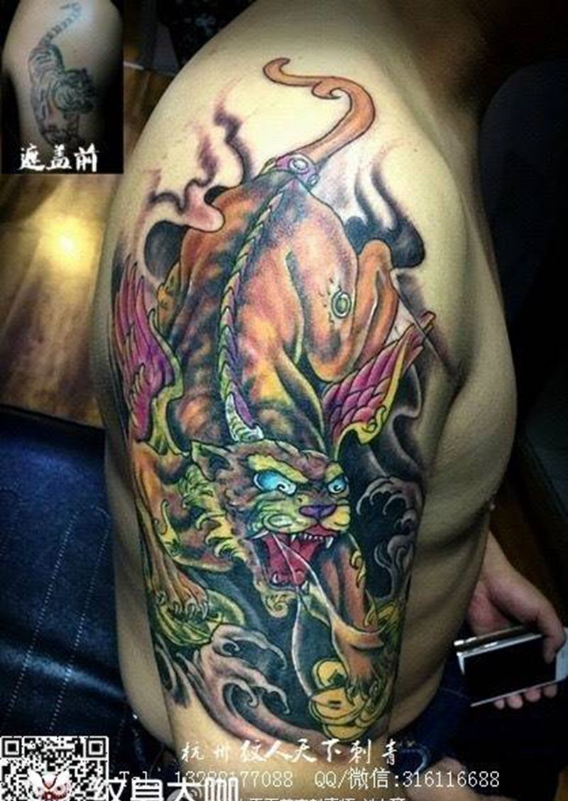 貔貅遮盖小花猫纹身图片