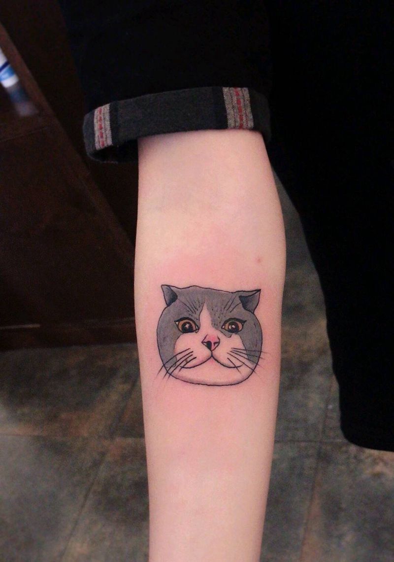 猫咪纹身纹身图片_手臂纹身图案