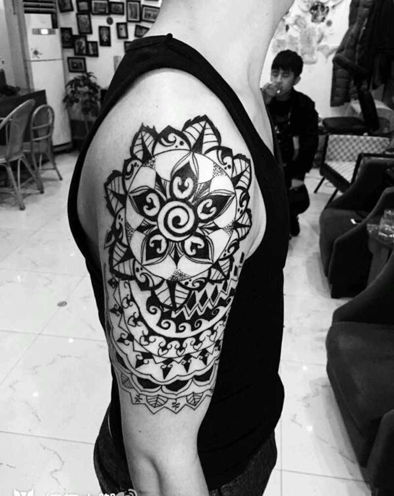 大臂纹身   梵花纹身图片