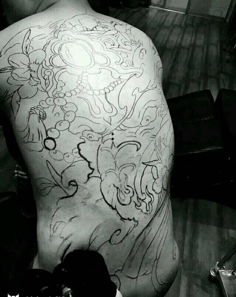 象神进行中纹身图片