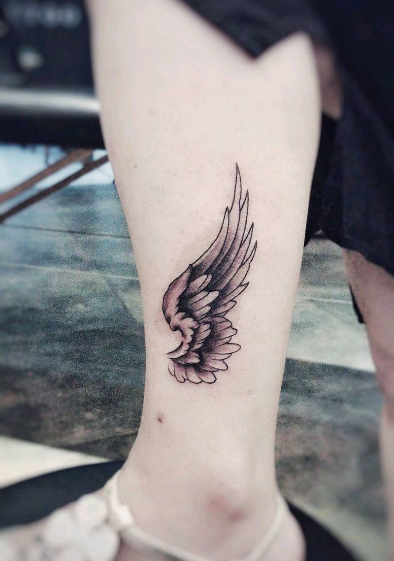 翅膀纹身纹身图片_腿部新传统纹身图案