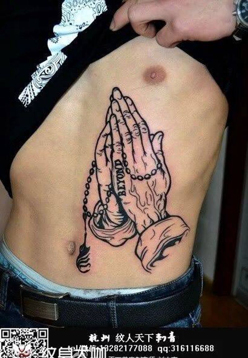 祈祷的手纹身图片