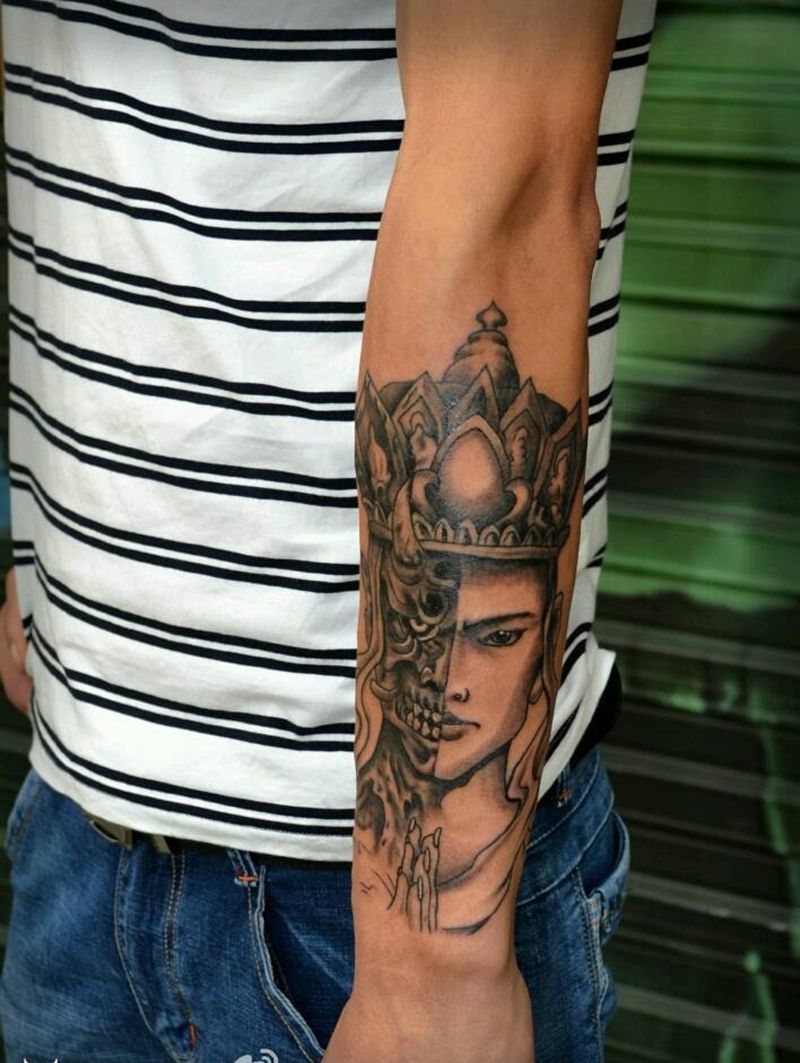 小臂纹身   佛与魔一念之间纹身图片