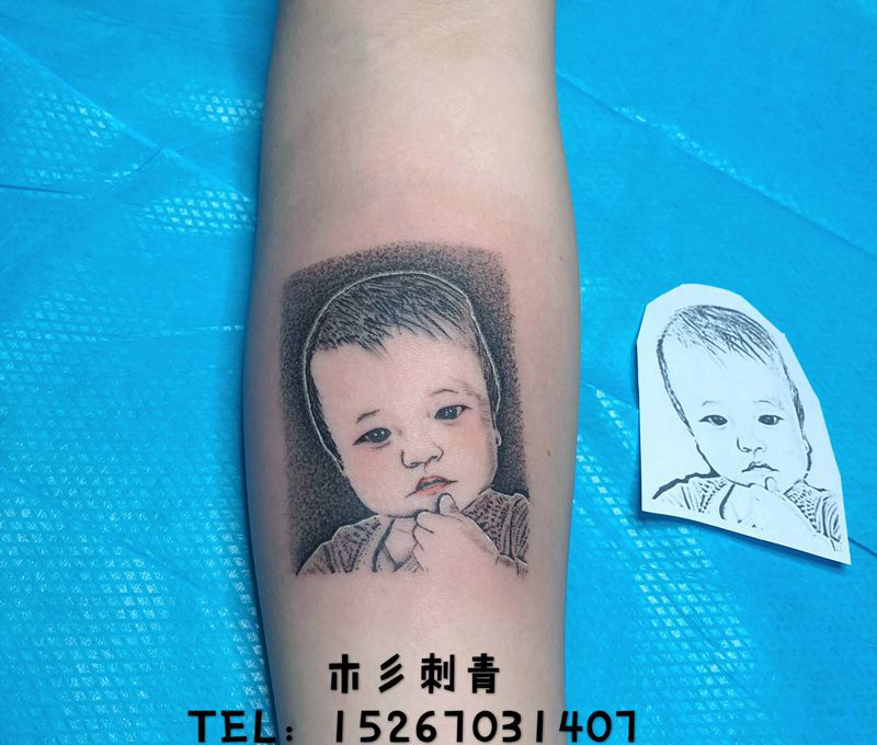 自己儿子身上纹纹身图片_手臂纹身图案