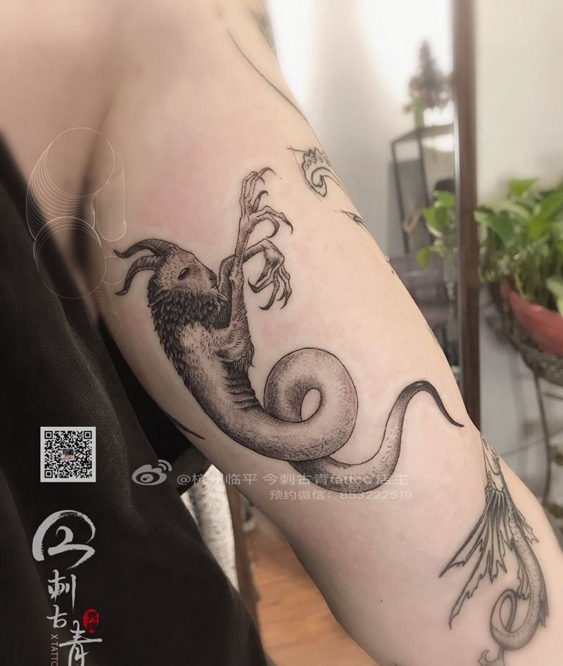 恶魔吧纹身图片_手臂点刺几何纹身图案