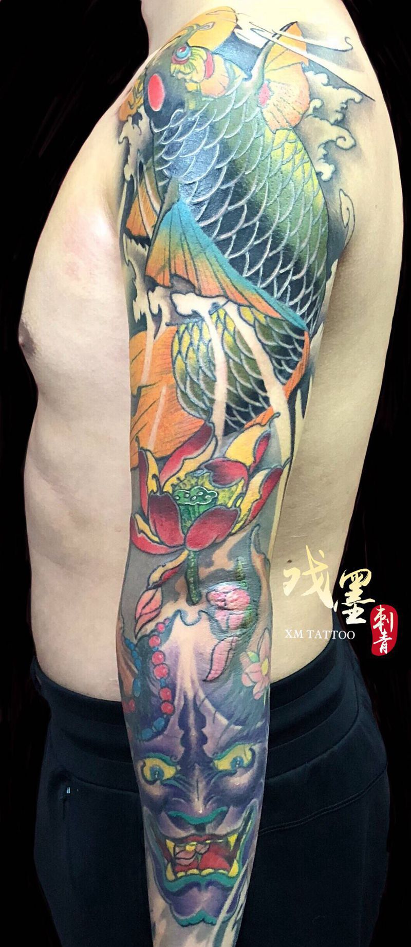 鲤鱼般若花臂纹身图片_手臂新传统纹身图案