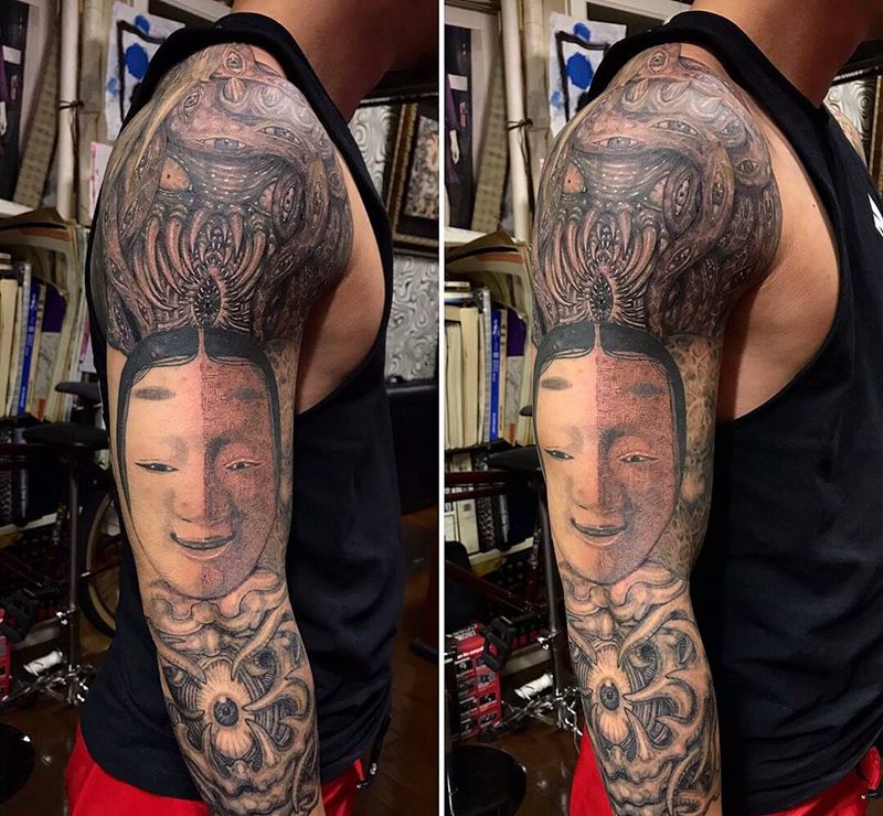 牵动纹身图片_手臂老传统纹身图案