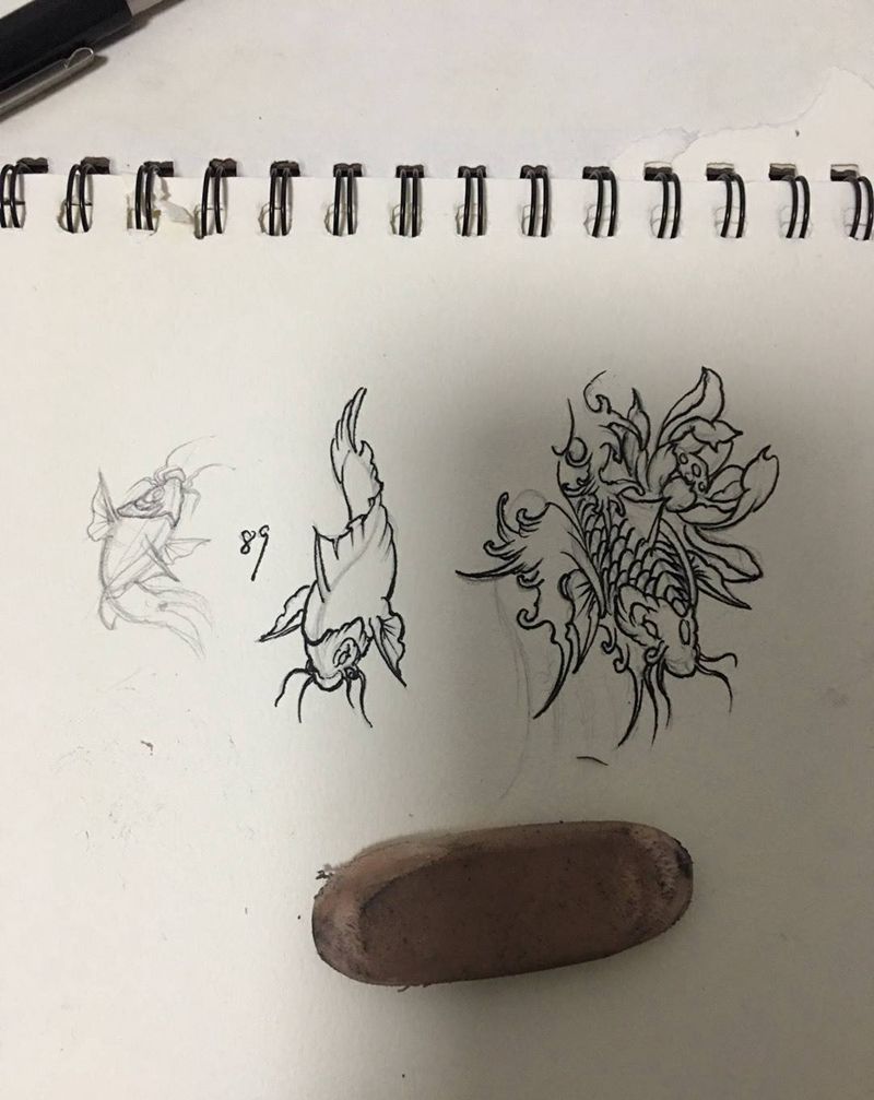 画几条小鱼苗纹身图片