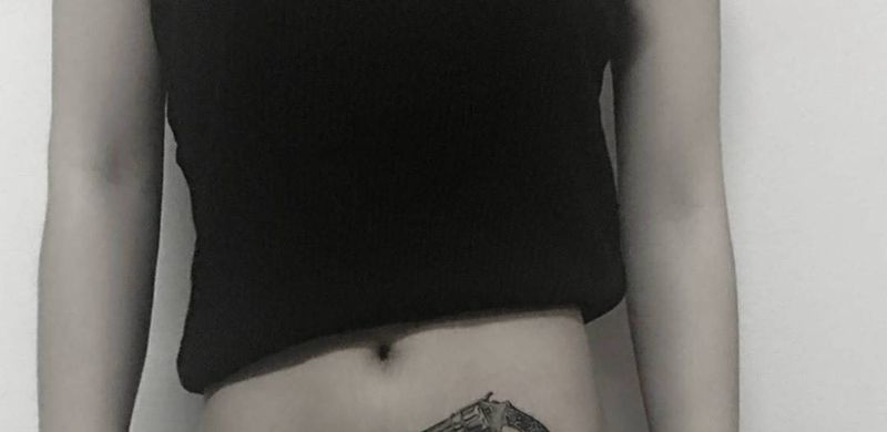 左轮纹身图片_点刺纹身图案