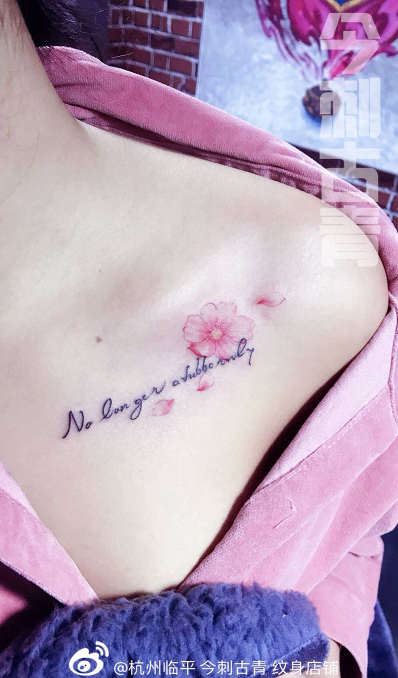 樱花纹身图片_肩部清新花臂女神纹身图案