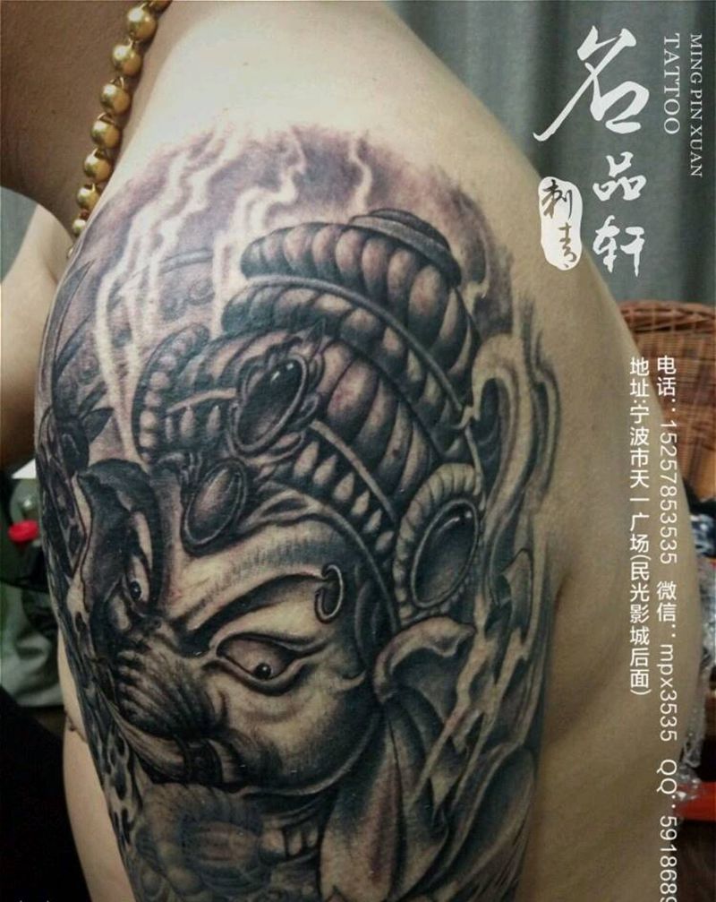 大臂象神纹身纹身图片_手臂传统动物成品纹身图案