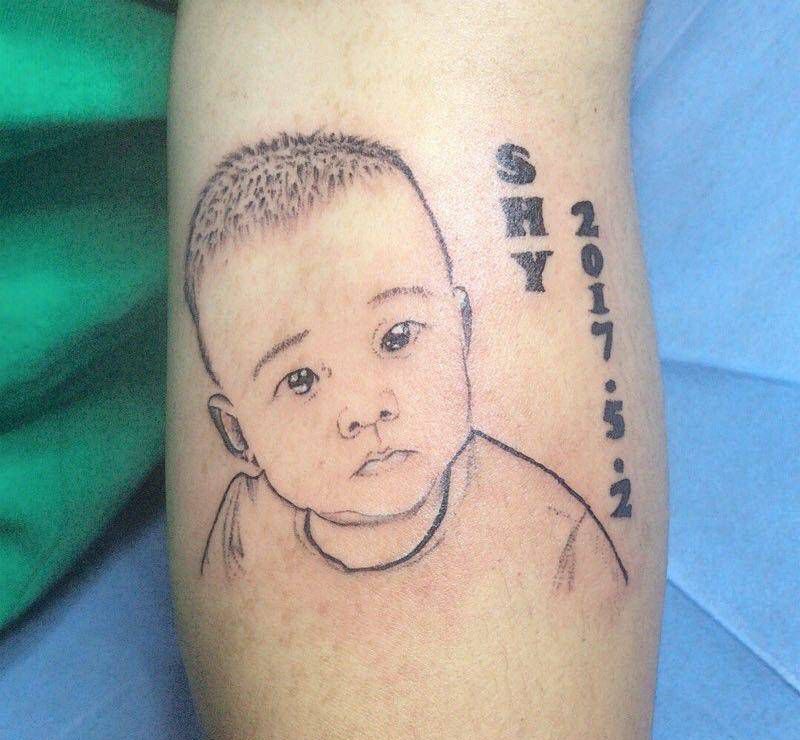 儿子纹身图片_点刺纹身图案