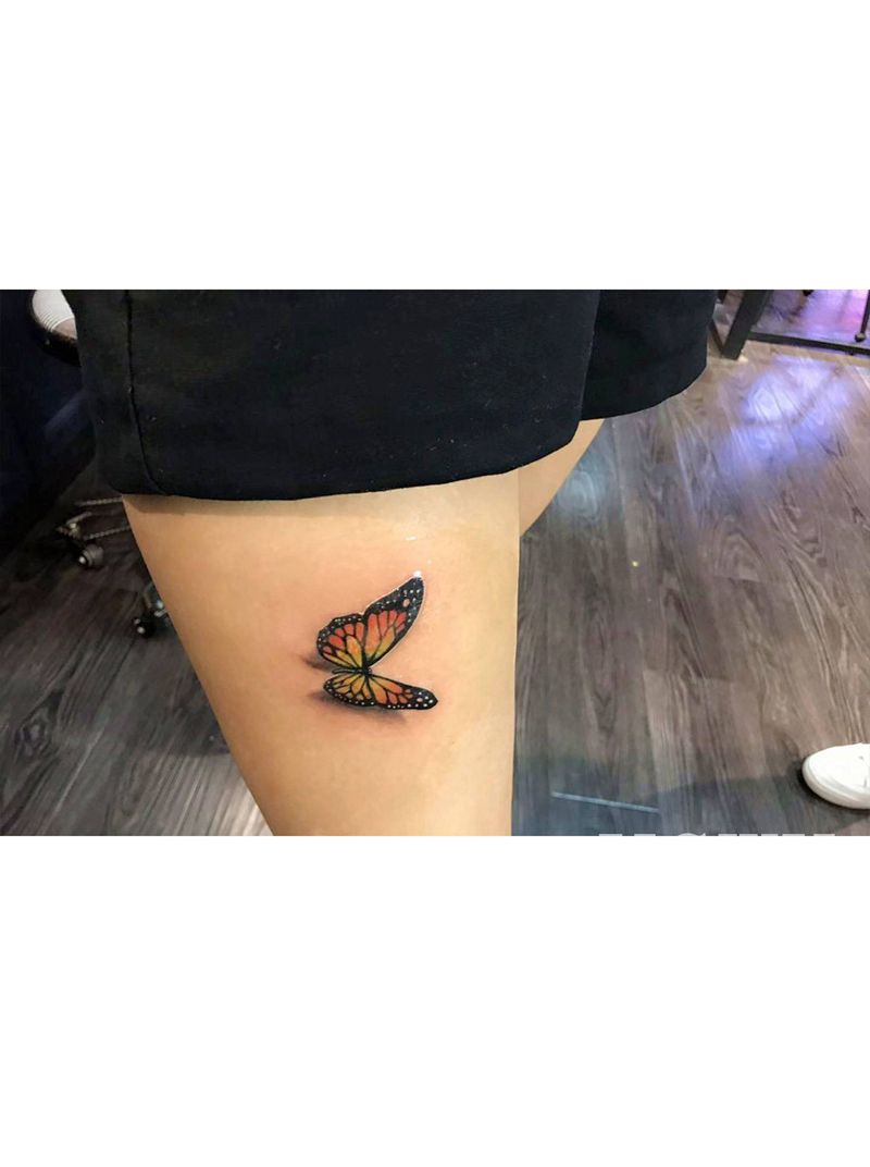 蝴蝶纹身图片_腿部纹身图案