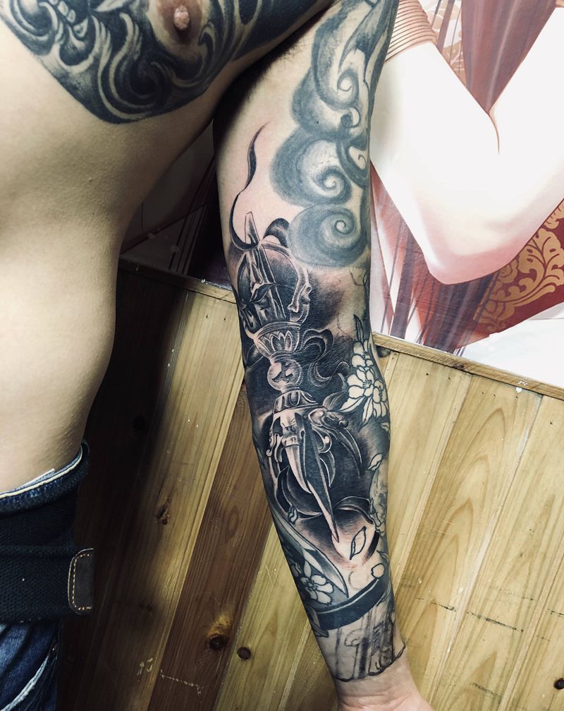 添加降魔杵一枚纹身图片_手臂纹身图案