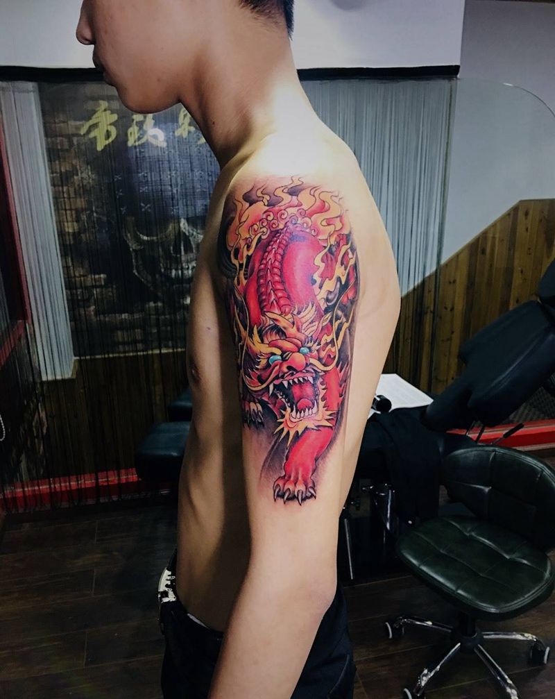 大臂招财麒麟纹身图片