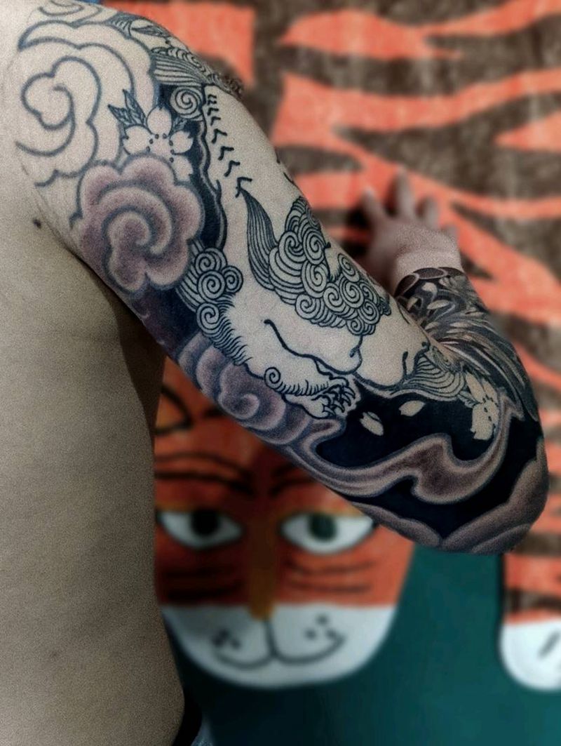 唐狮花臂未完成纹身图片_手臂老传统新传统纹身图案