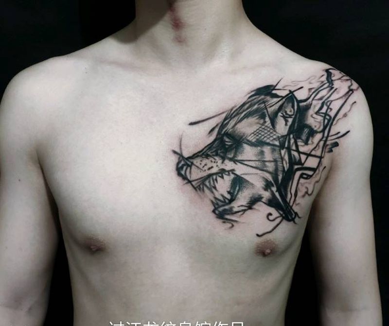 狼头纹身图片_胸部点刺几何狼头纹身图案