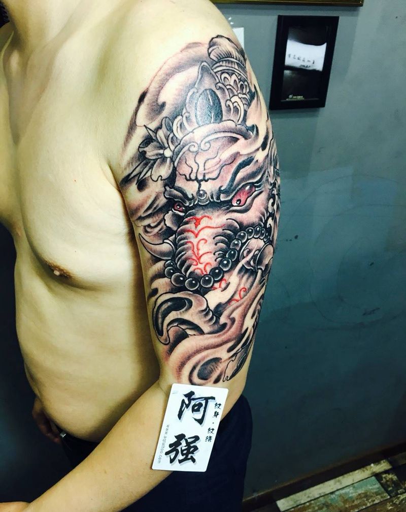 遮盖象神纹身图片