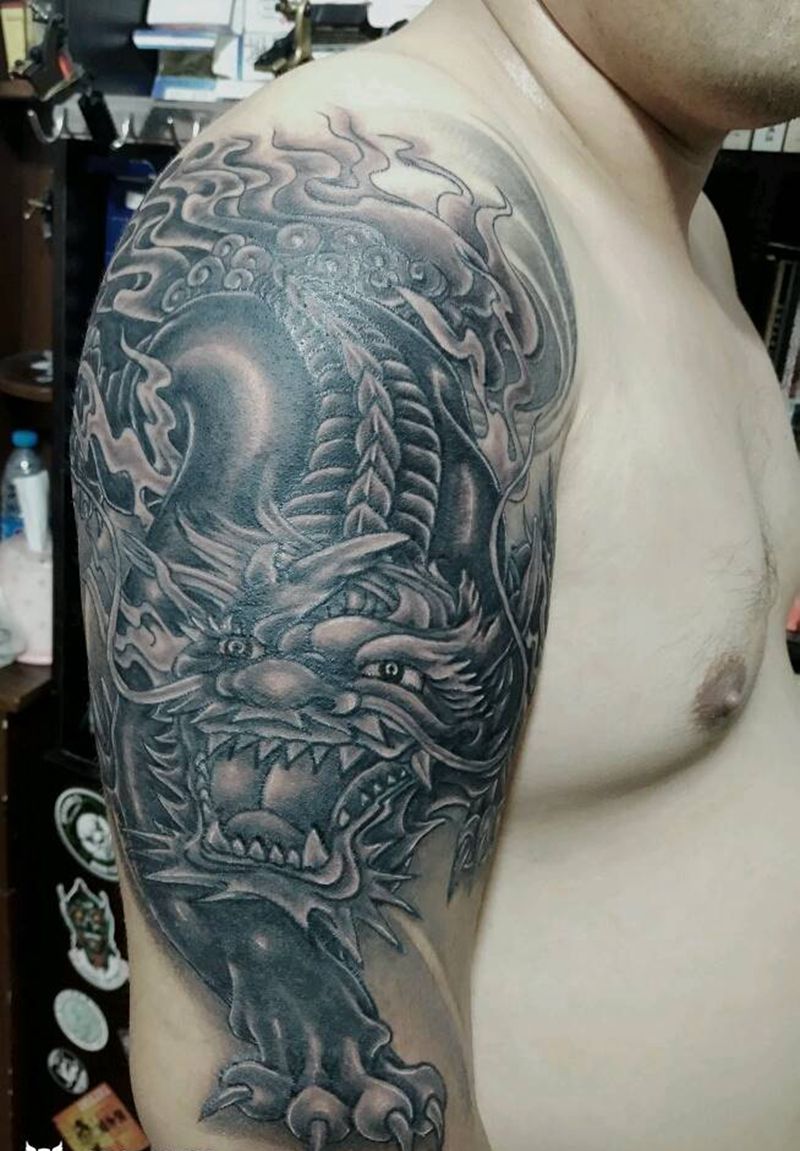 麒麟臂纹身图片_手臂传统动物纹身图案