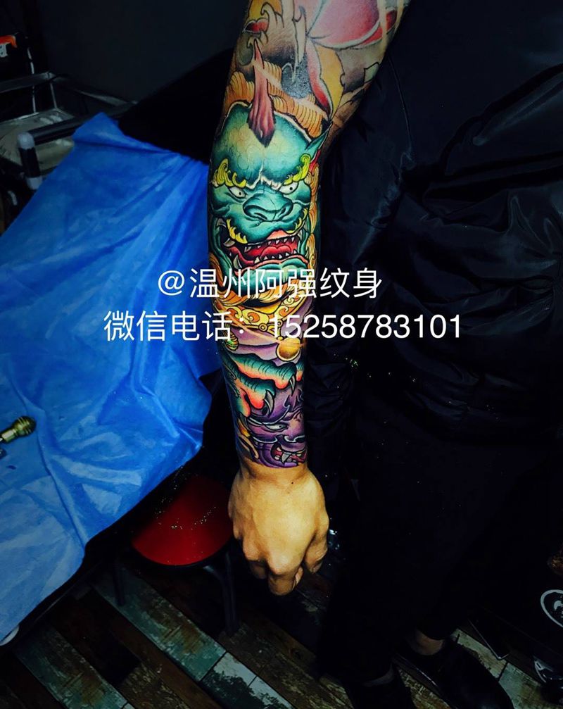 唐狮花臂纹身图片