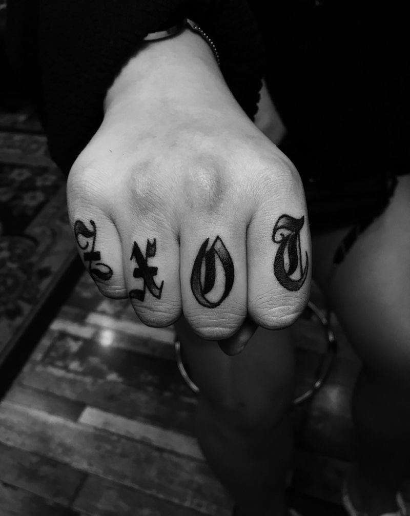 手指花体纹身图片