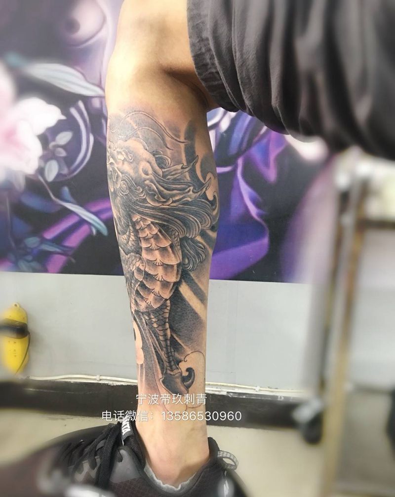 小腿招财麒麟纹身图片