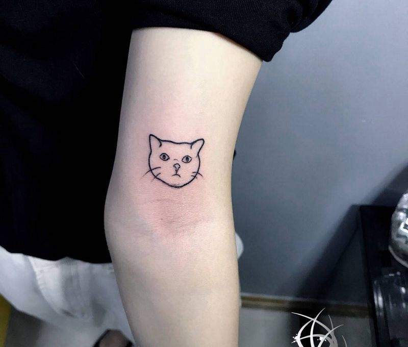 小猫纹身图片_手部纹身图案