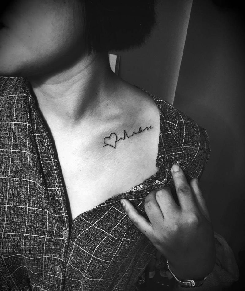 小图两个纹身图片_手臂肩部清新宗教纹身图案