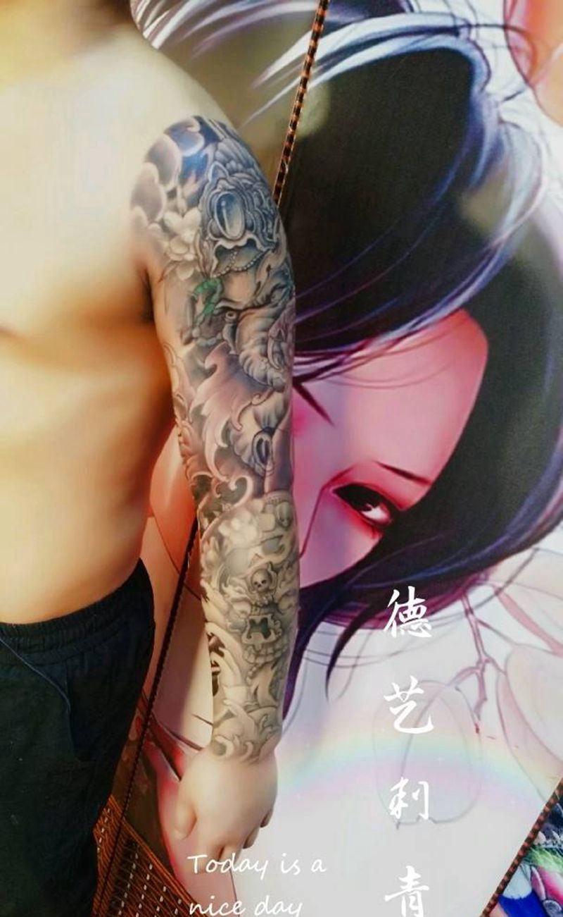 花臂纹身图片_手臂新传统纹身图案