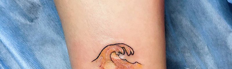 浪纹身图片_腿部纹身图案