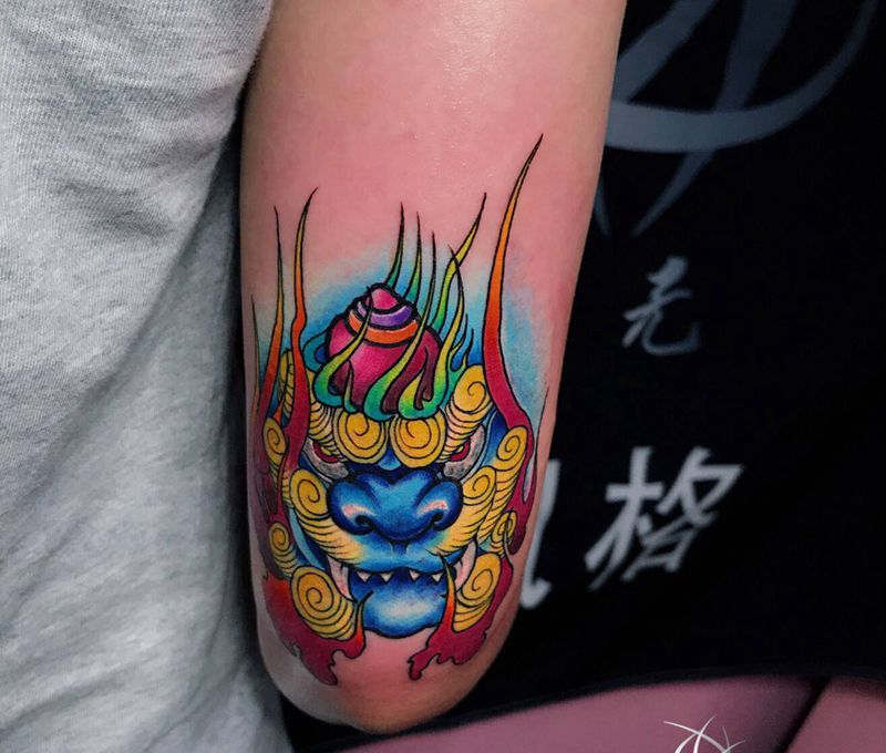 唐狮纹身图片_手部纹身图案