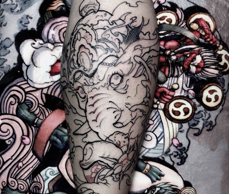 线纹身图片_成品腿部传统鬼神纹身图案