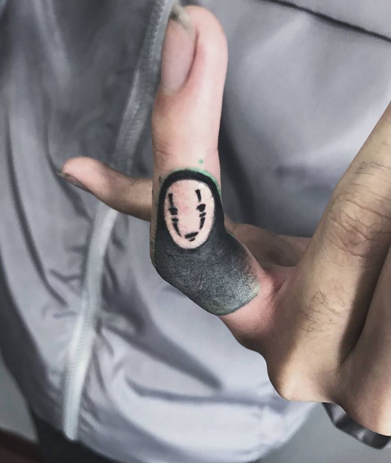 无脸男遮盖纹身图片_成品手部清新传统鬼神动物纹身图案