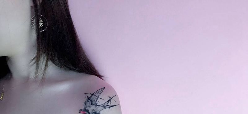 遮盖纹身图片_成品肩部清新动物纹身图案