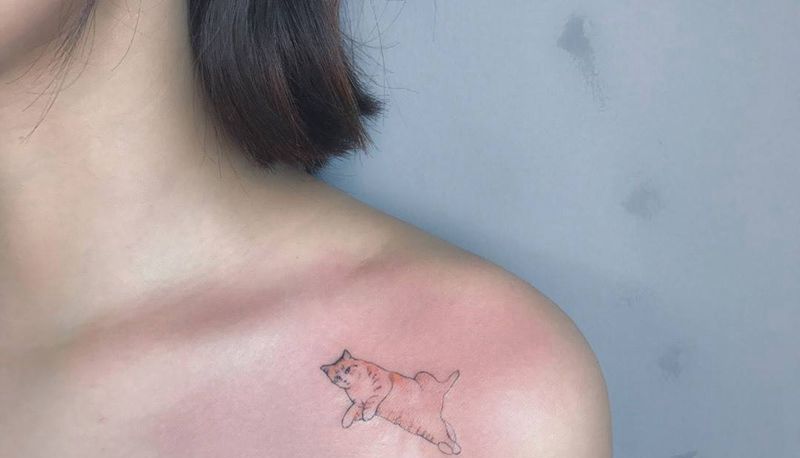 小胖纹身图片_肩部成品清新动物纹身图案