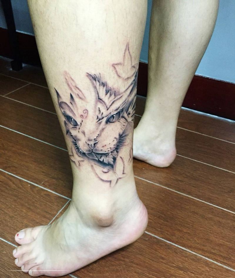 猫咪纹身图片_成品腿部写实清新动物纹身图案