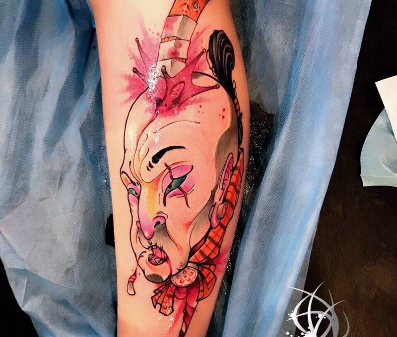 生首纹身图片_腿部纹身图案