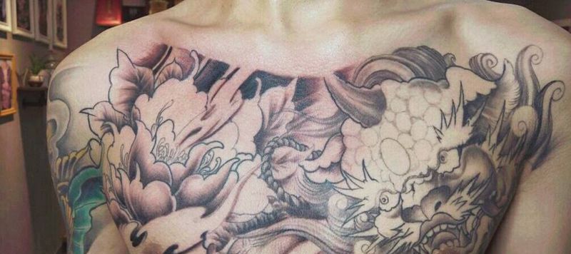 唐狮纹身图片_胸部新传统纹身图案