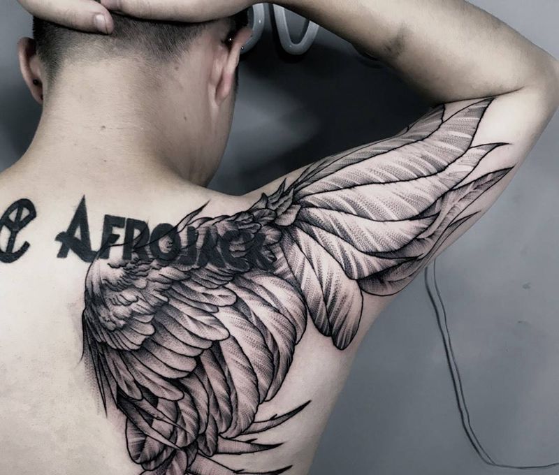 羽人纹身图片_成品背部清新欧美动物纹身图案