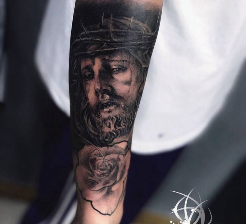 耶稣纹身图片_手臂纹身图案